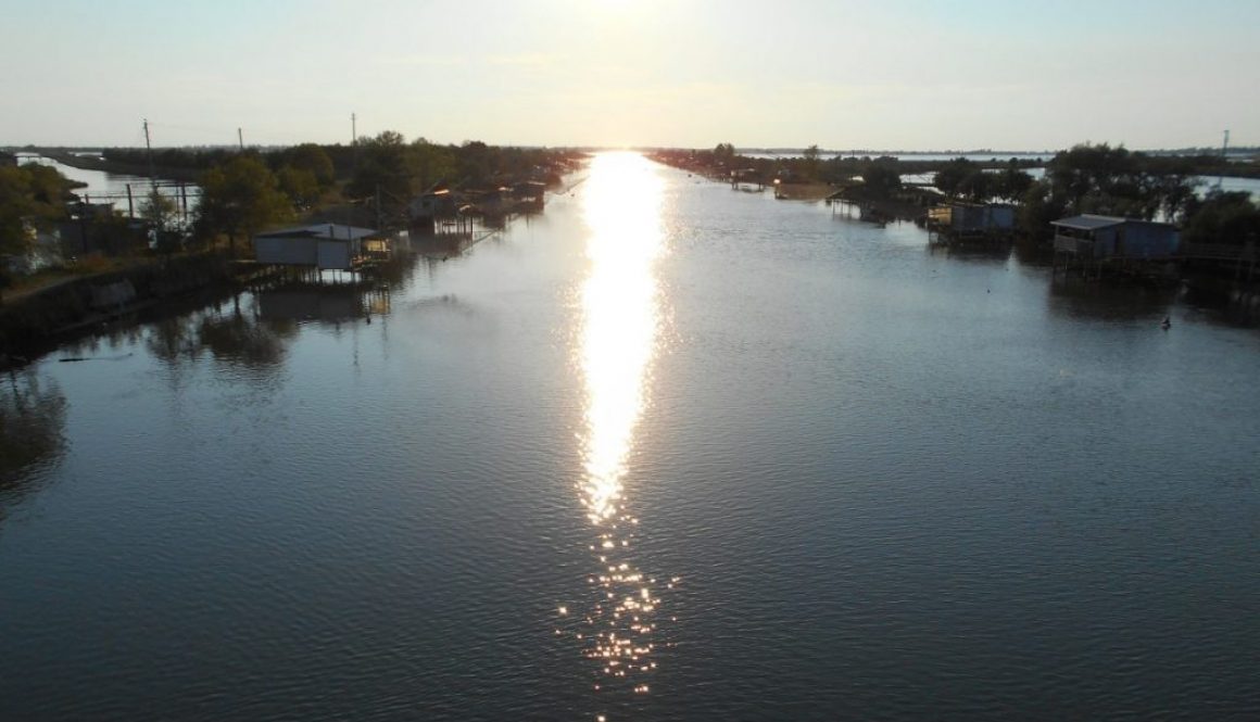 tramonto sulle valli e casoni da pesca, Comacchio